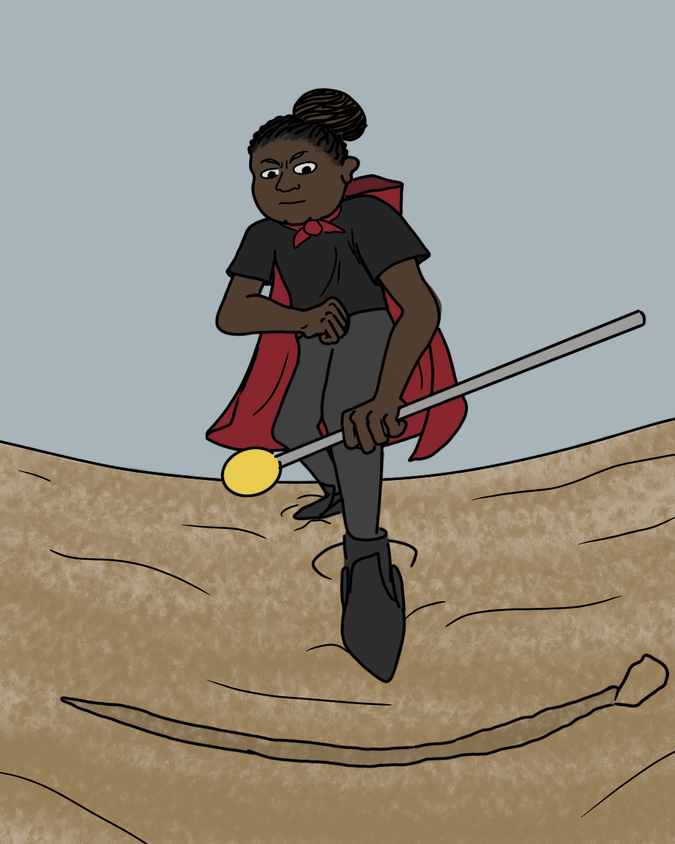 A young black woman wearing a red hooded cape standing in a defensive pose with her cane in some sand