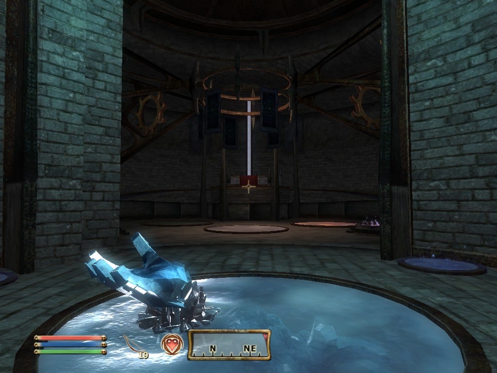 Picture of the interior of Frostcrag Spire, where a giant hand made of ice is coming out of the floor in front of a tall doorway into the inner sanctum